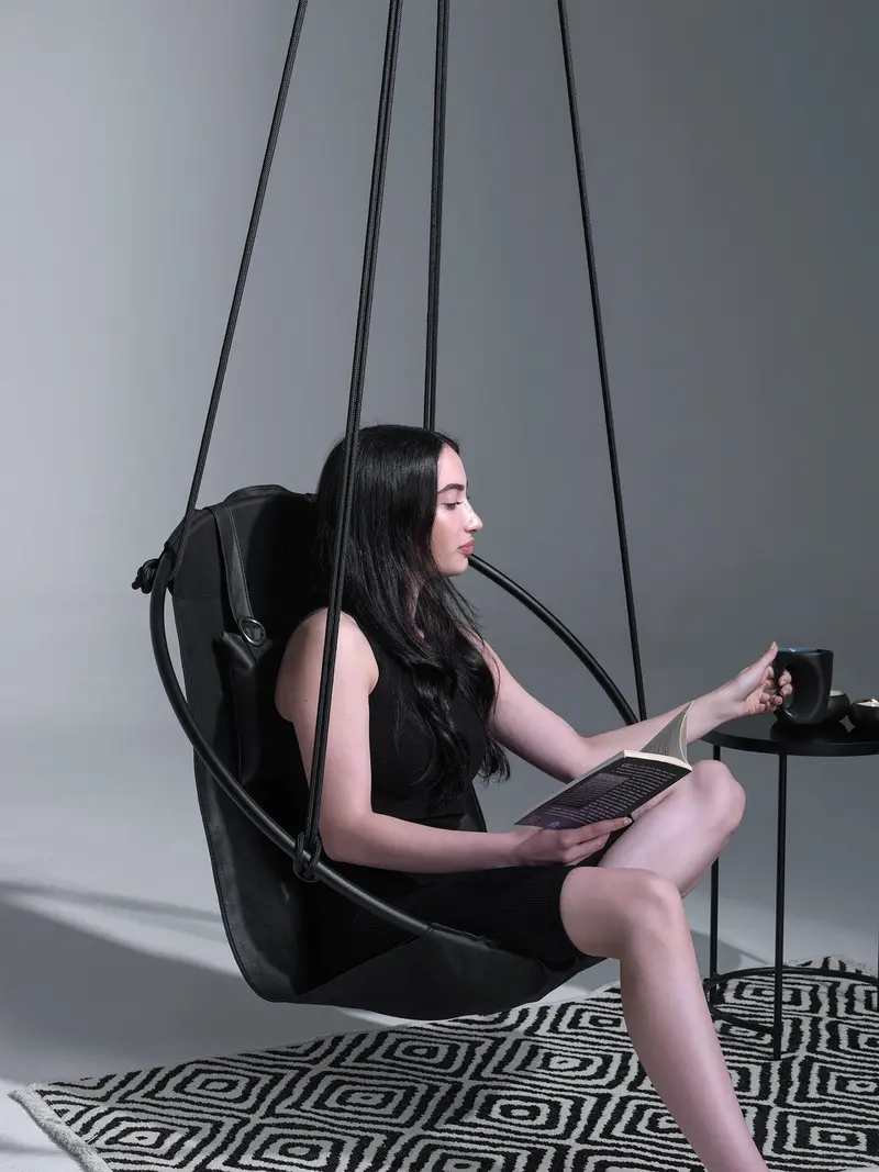 Black Leather Hanging Chair – Sleek Aerial Seating Option 1
